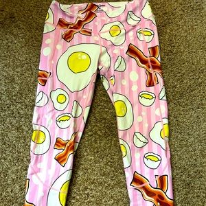 Feed Me Fight Me over easy leggings